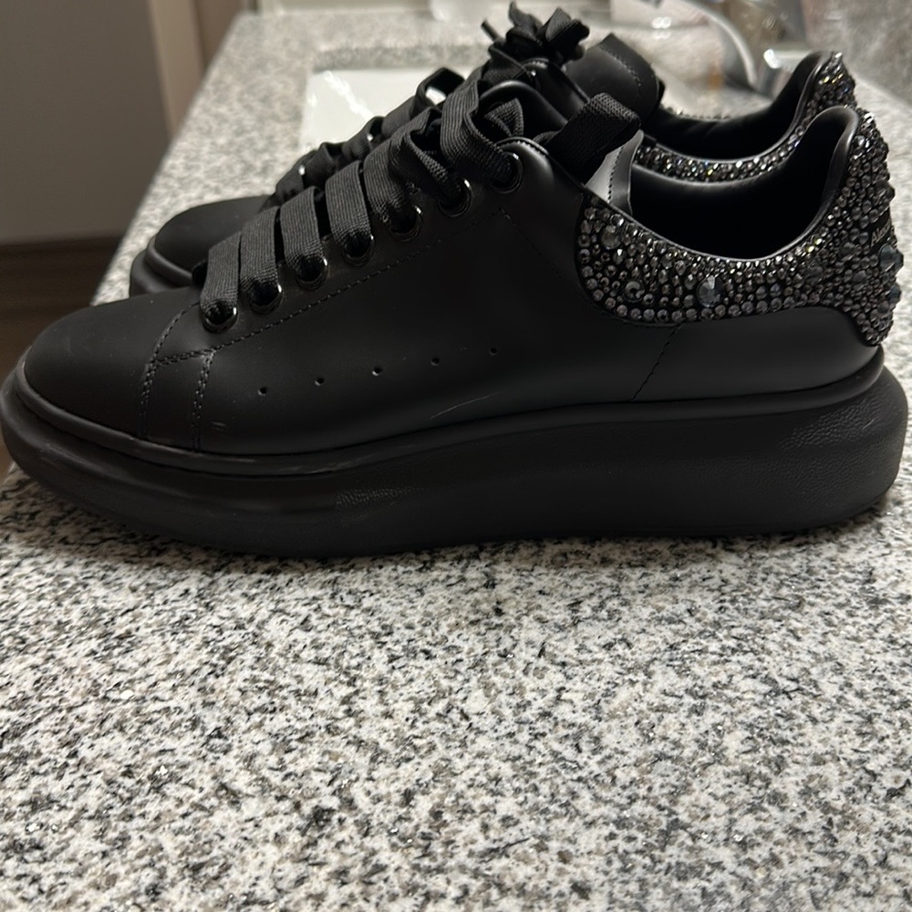 All black studded Alexander McQueen’s